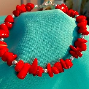 Oggie design deep red coral bracelet.